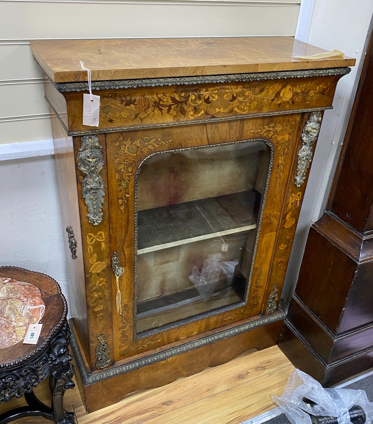A pair of Victorian gilt metal mounted marquetry inlaid walnut pier cabinets, width 83cm, depth 31cm, height 115cm
